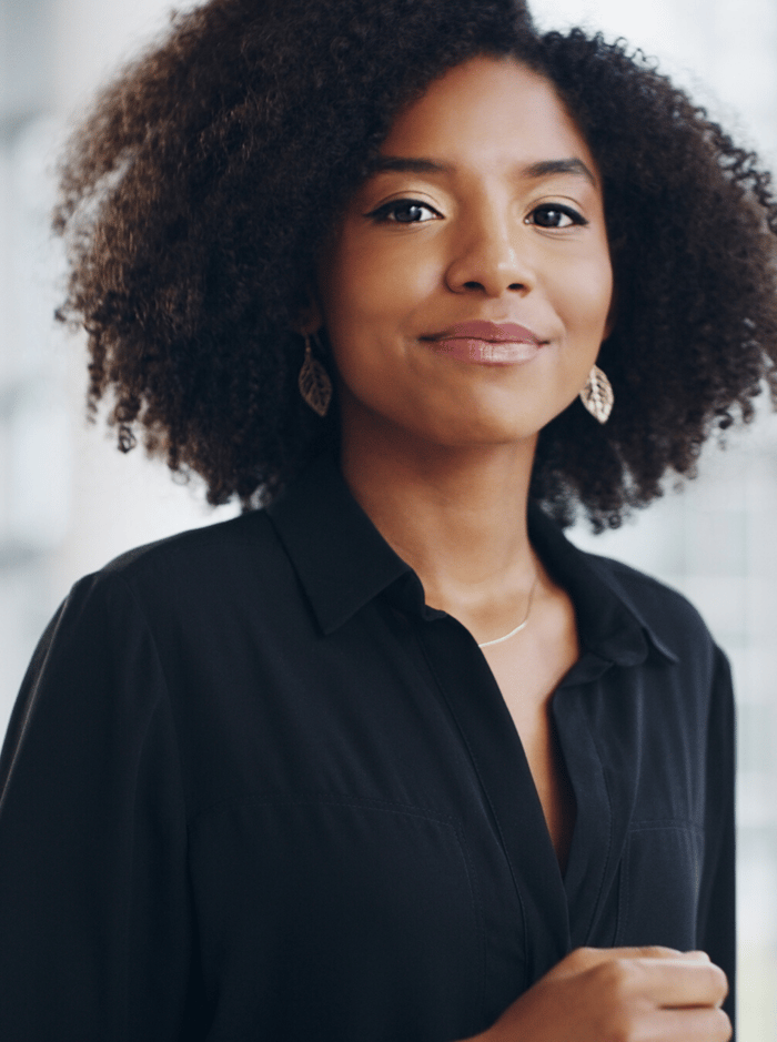 A woman smiling at the camera