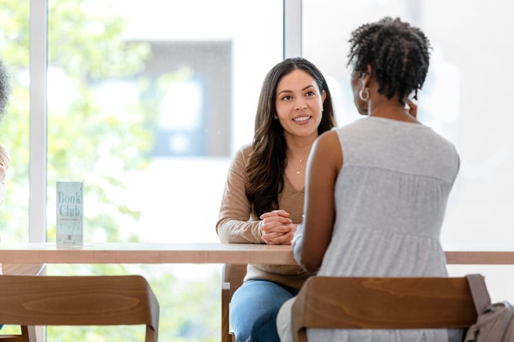 two women meeting in cafe